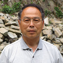 代表　我妻　健一